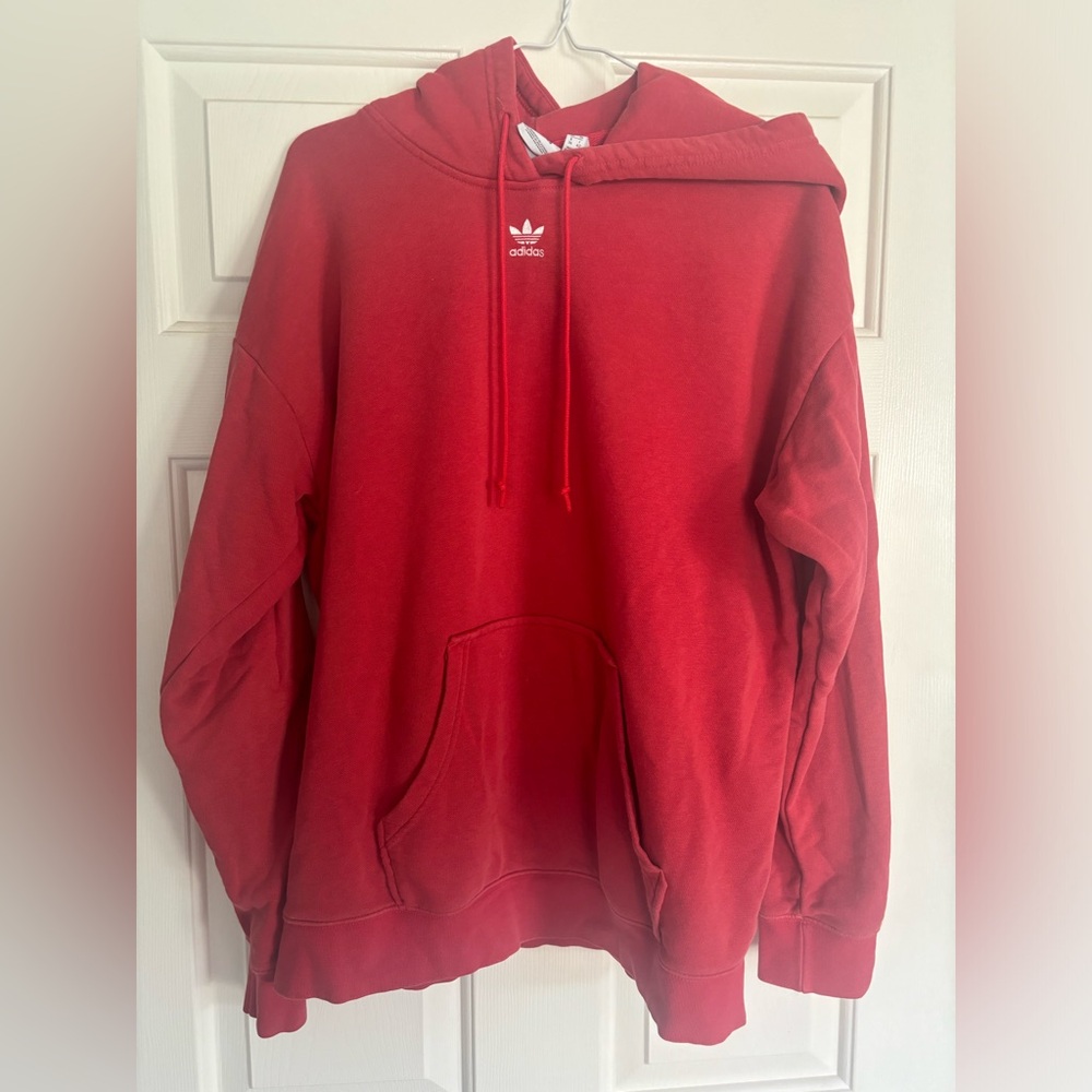 Size small, oversized, reddish-pink Adidas hoodie